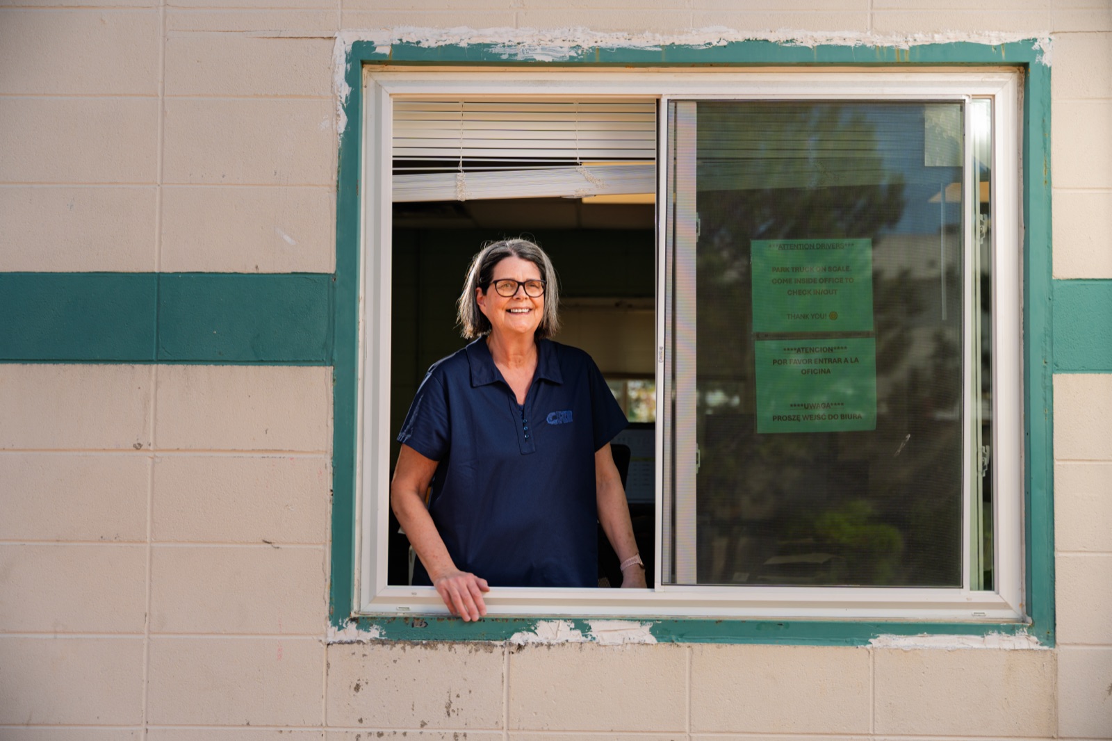 Barb Parker at the CRI scale house window in Addison, IL